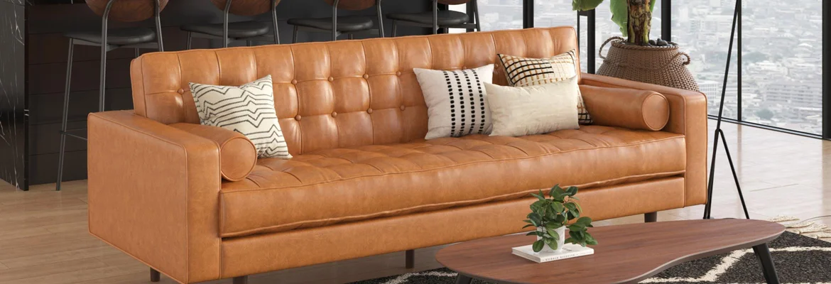 tan leather mid century sofa in penthouse