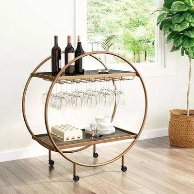 metal and glass bar cart with bottles and wine glasses