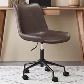 brown leather office chair at walnut desk